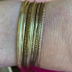 Elegant Gold Bangle Set. 8 Bangles